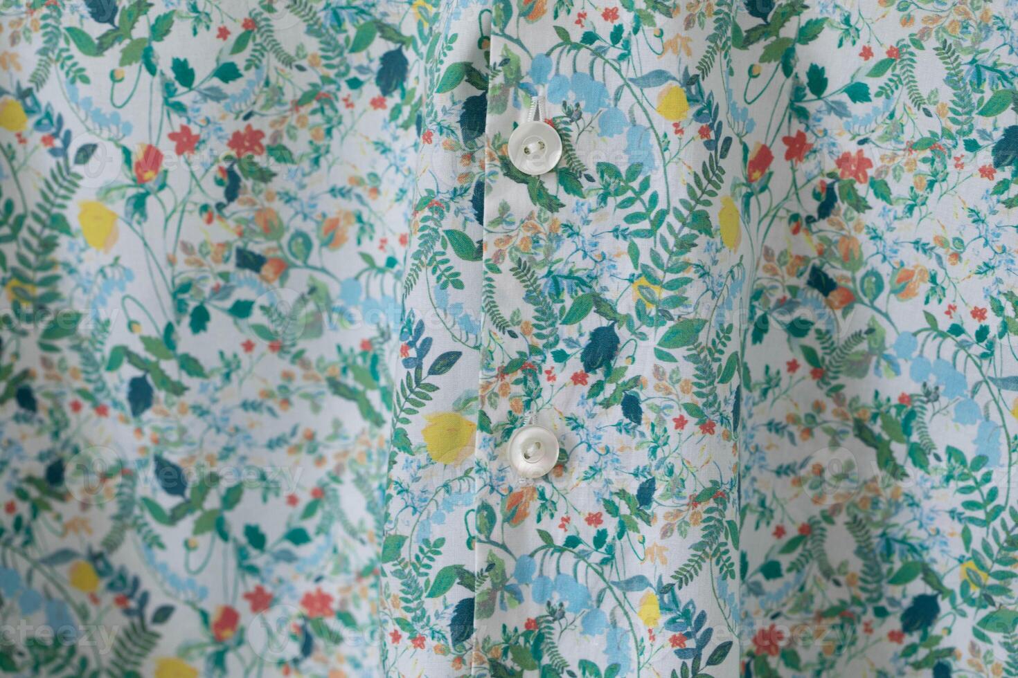 Textile pattern with floral ornament on fabric. photo