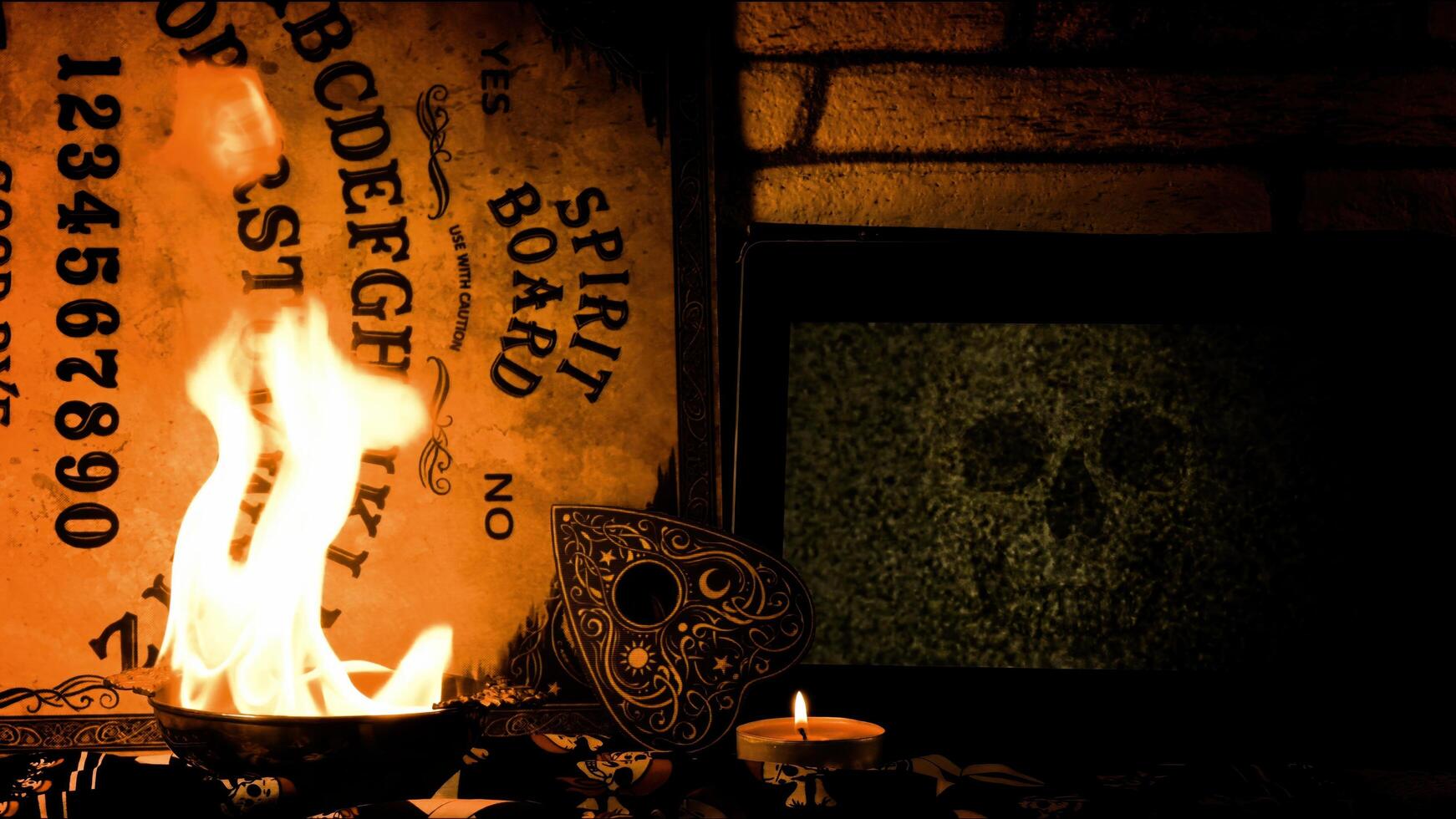 A Witchcraft Spiritual Halloween Game Ouija Board in Fire photo