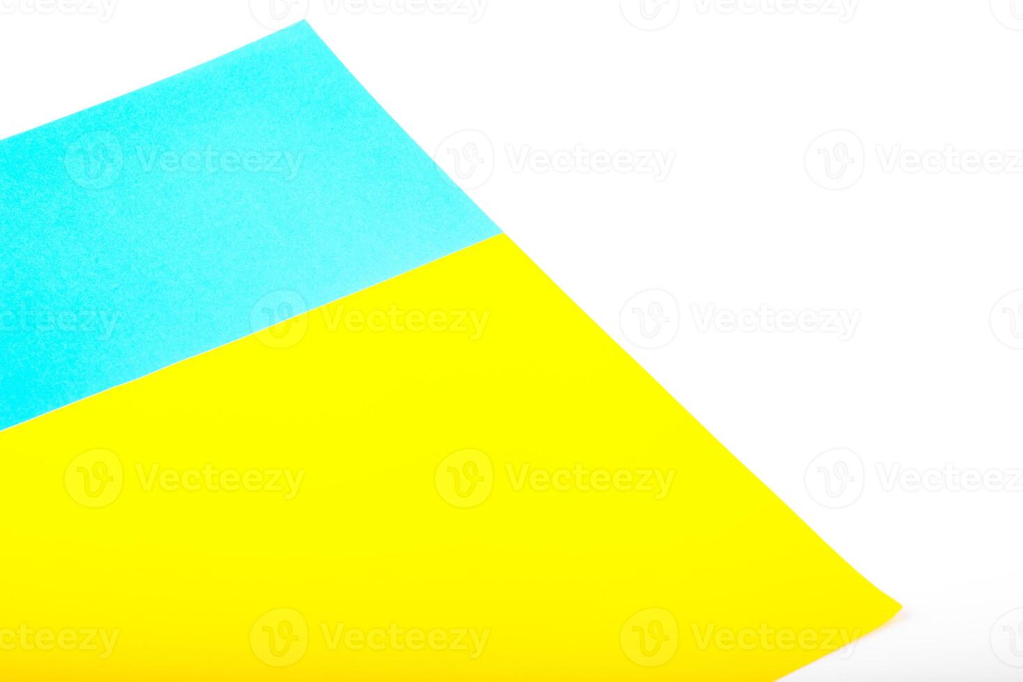 Paper yellow and blue colours as the symble flags of Ukraine. Background for protest against war, military conflict. photo