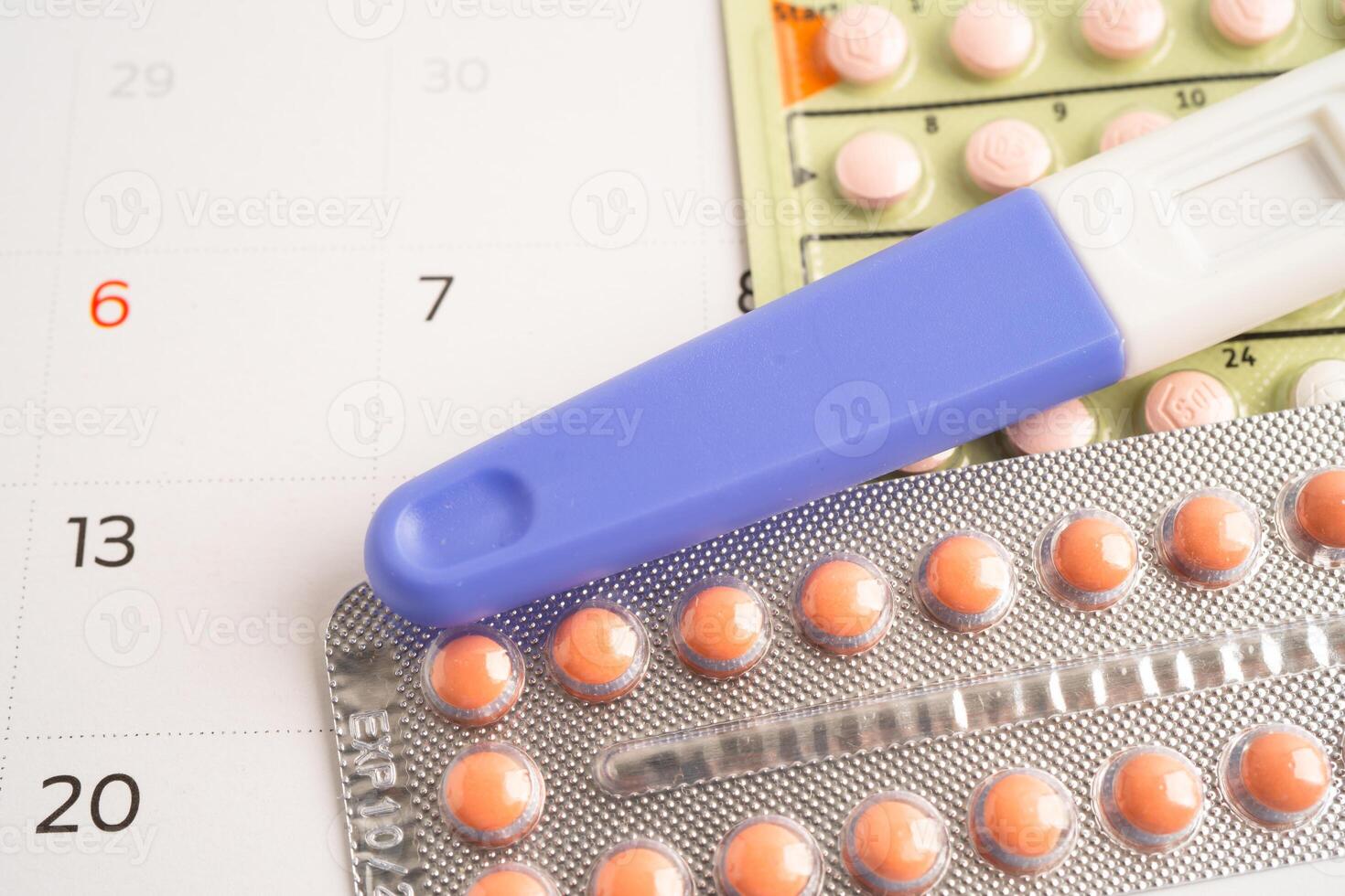 Pregnancy test and birth control pills, contraception health and medicine. photo