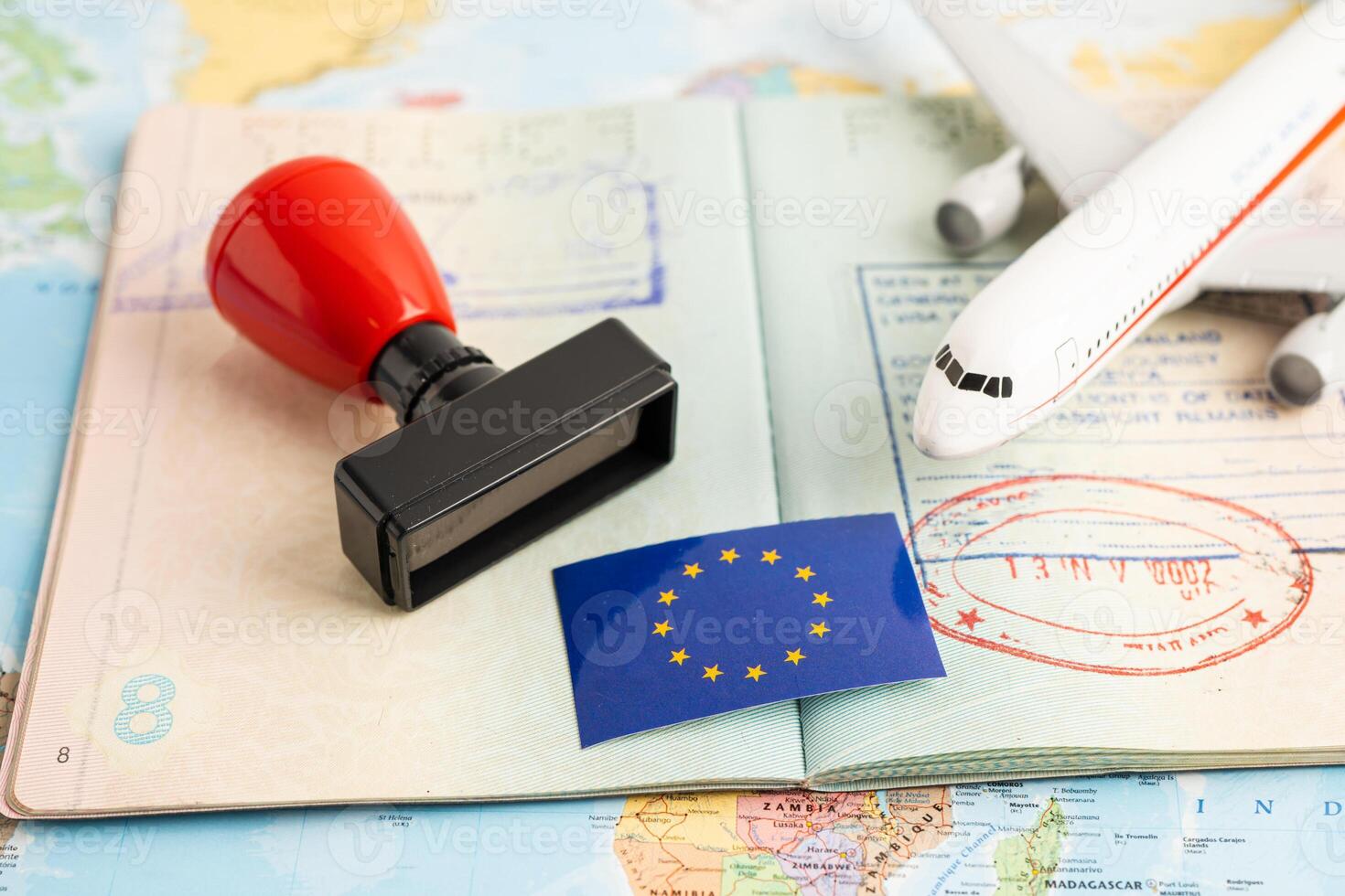 Approved Stamp passport with EU flag document to immigration at airport in country. photo