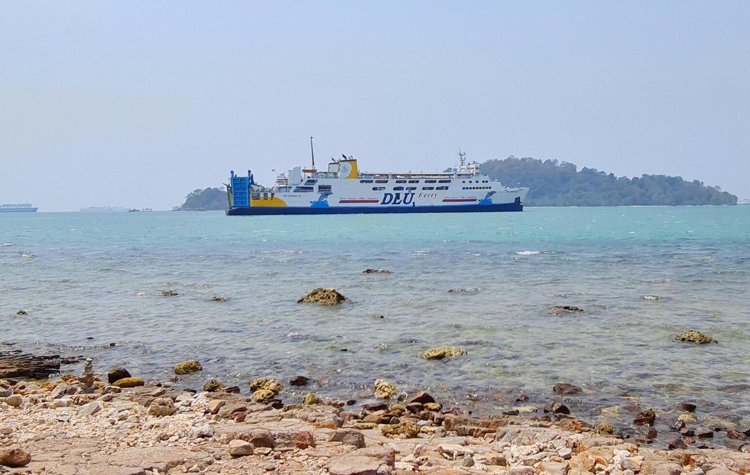 Merak, Indonesia on July 9 2023. A ferry ship with the code Ferizu is heading to the port of Merak. photo