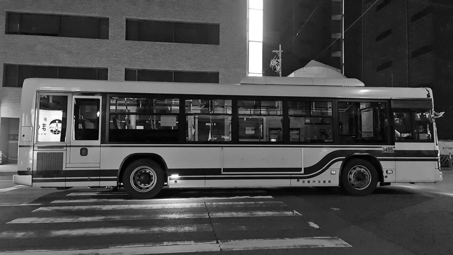 Kyoto, Japan on October 5, 2023. Hybrid Bus Kyoto, Bus Hino at night. T photo