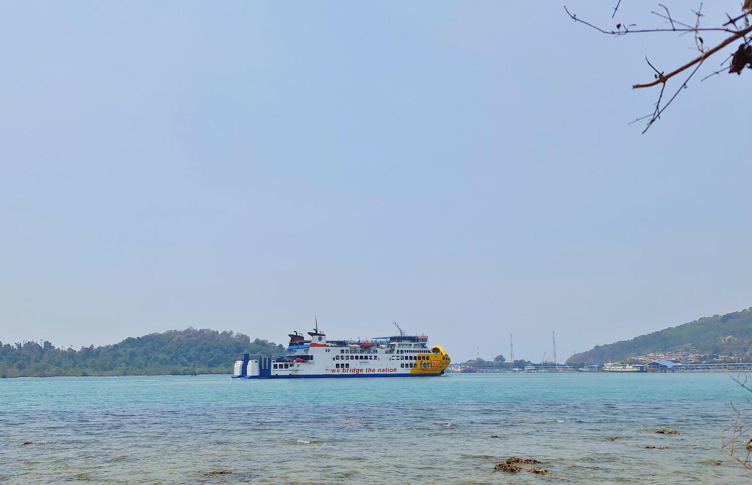 Merak, Indonesia on July 9 2023. A ferry ship with the code Ferizu is heading to the port of Merak. photo