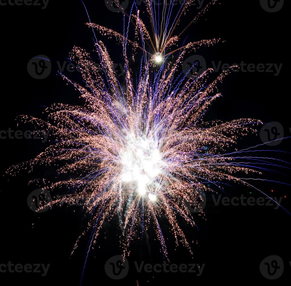 Colorful fireworks in the night sky photo