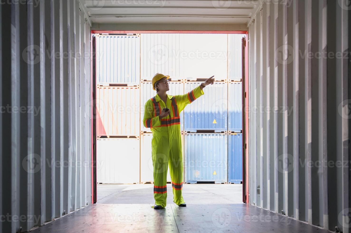 Foreman standing inside of empty container for inspection condition before loading goods. photo