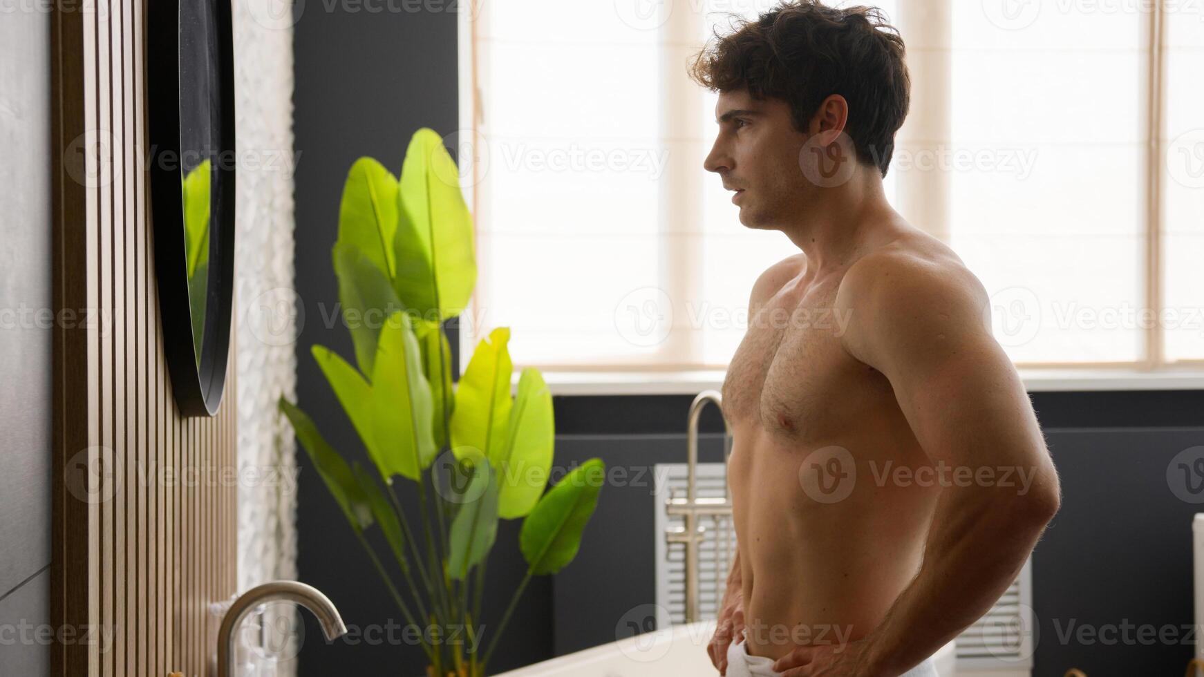 Caucasian confident man pretend shooting with hand in mirror reflection guy male at morning mental positive motivation mindset hygiene in bathroom pointing finger himself affirmation support self love photo