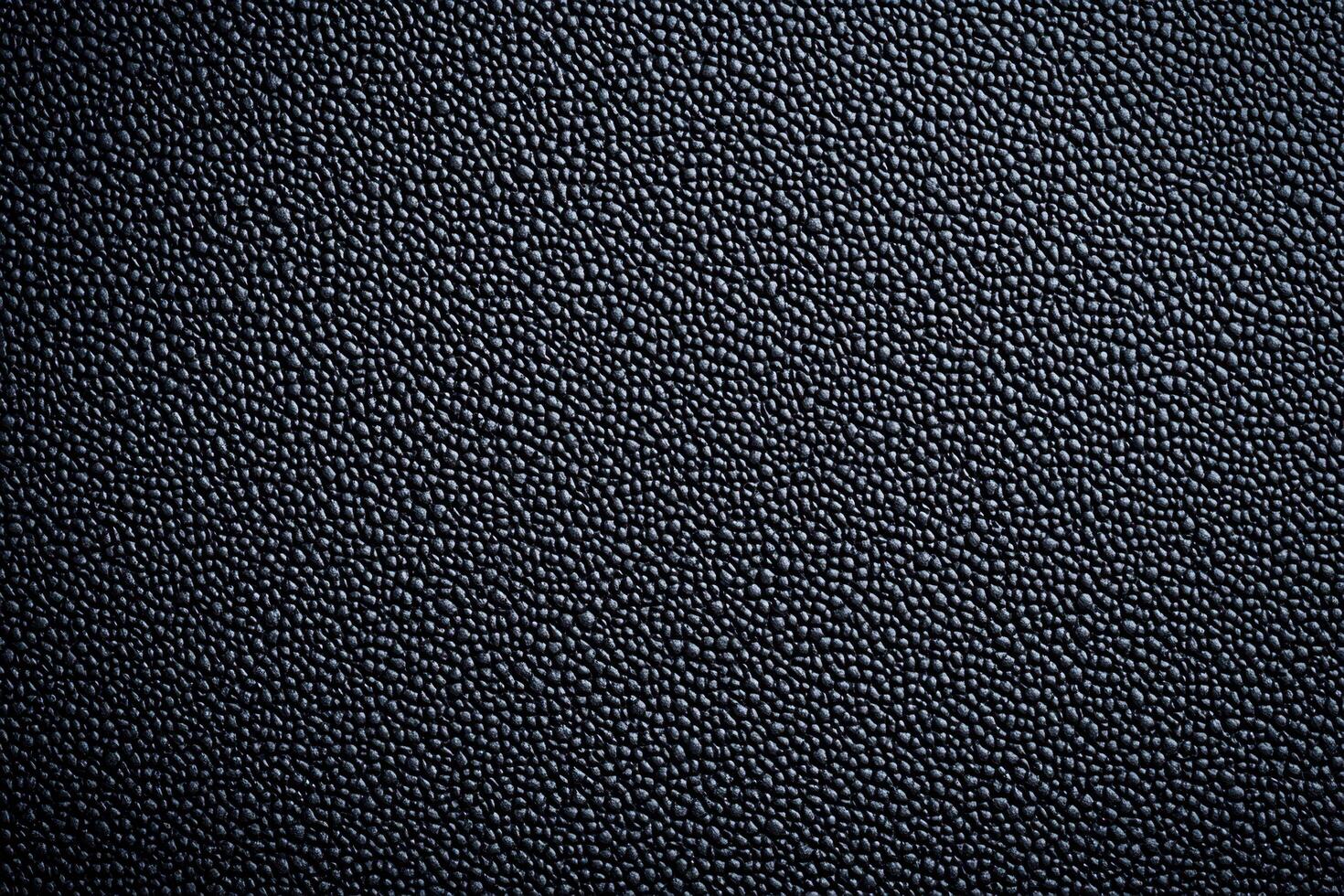A neoprene texture background features a smooth, slightly glossy surface with a subtle, durable feel photo