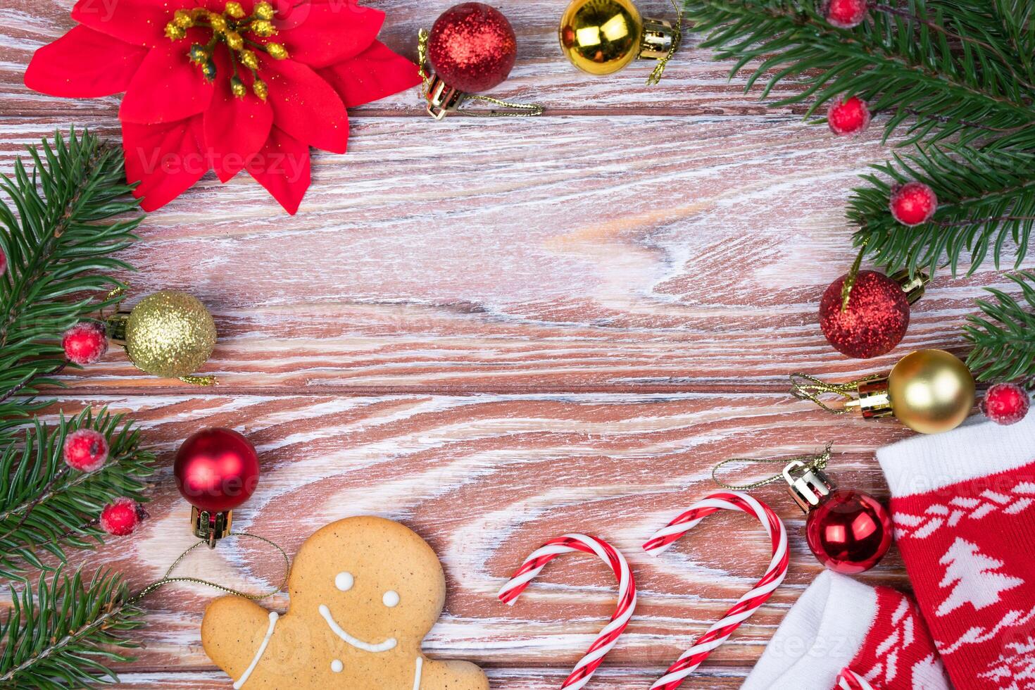 Festive background with Christmas decorations and spruce branches. Flatlay. Top view. Copy space. Selective focus. photo