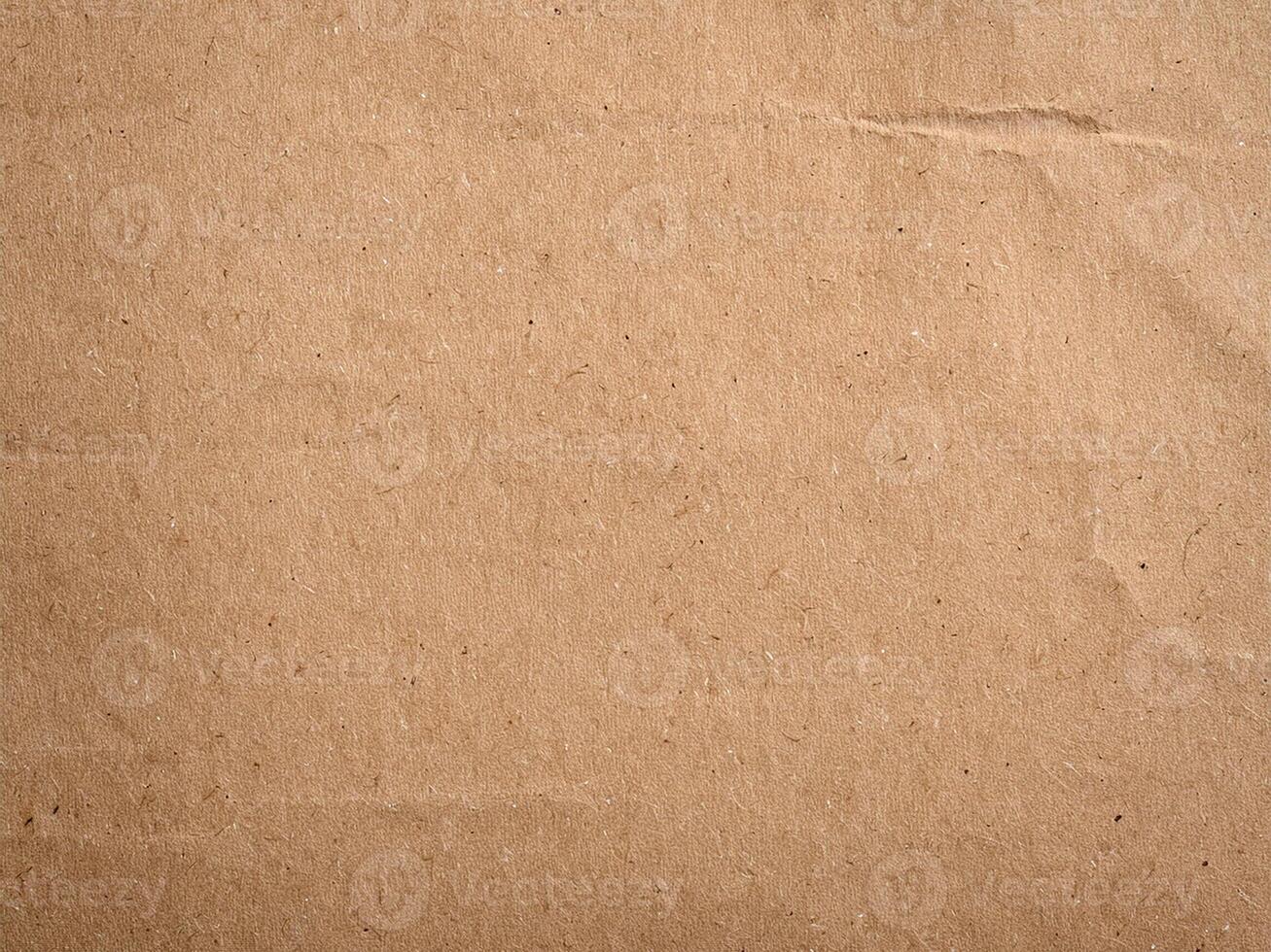 Recycled paper background. Old brown paper texture or background. photo