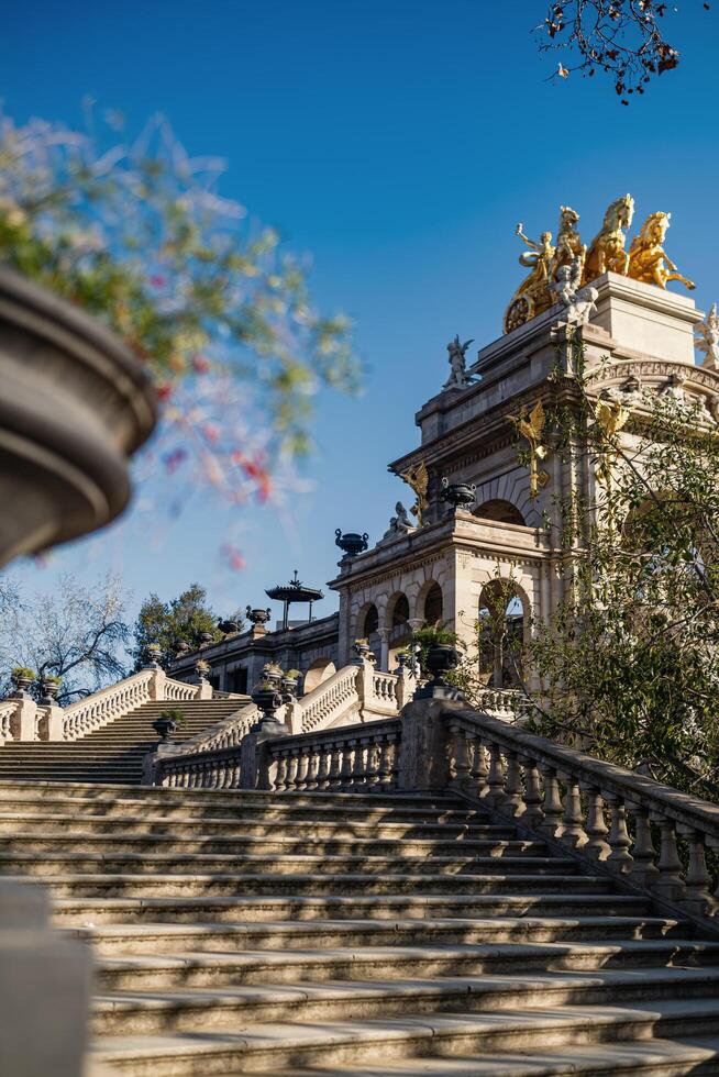 Barcelona, Catalonia, Spain, 2024 - View from below of one of the two staircases flanking the Cascada Monumental in the Ciutadella Park. photo