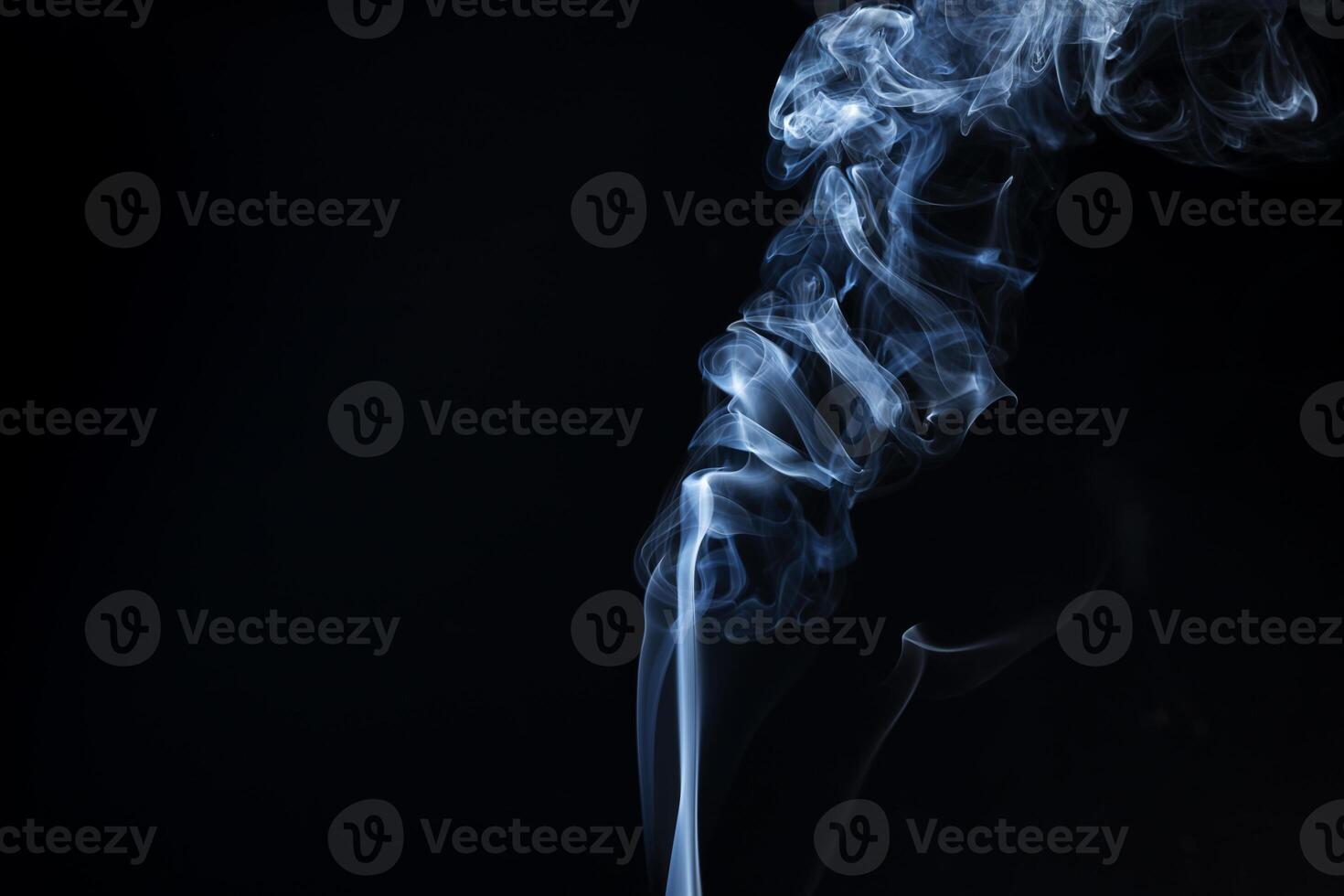 Smoke from flames or fog clouds graphic design art isolated on dark black background. photo