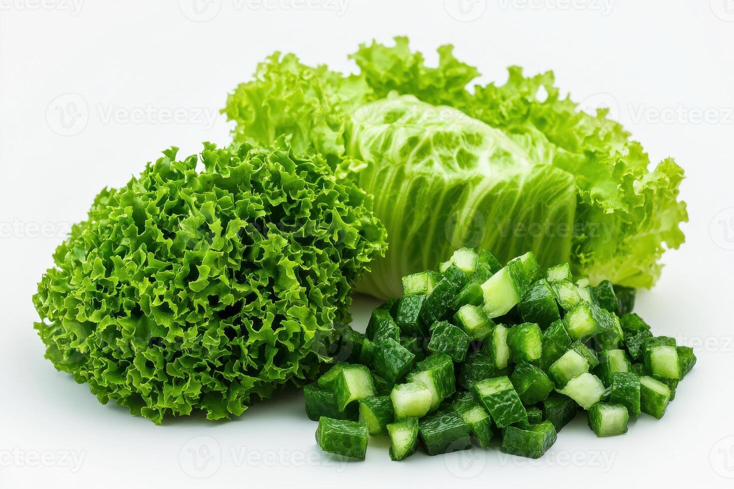 Fresh lettuce and diced cucumber arranged attractively on a white surface, showcasing vibrant greens in a healthy composition photo