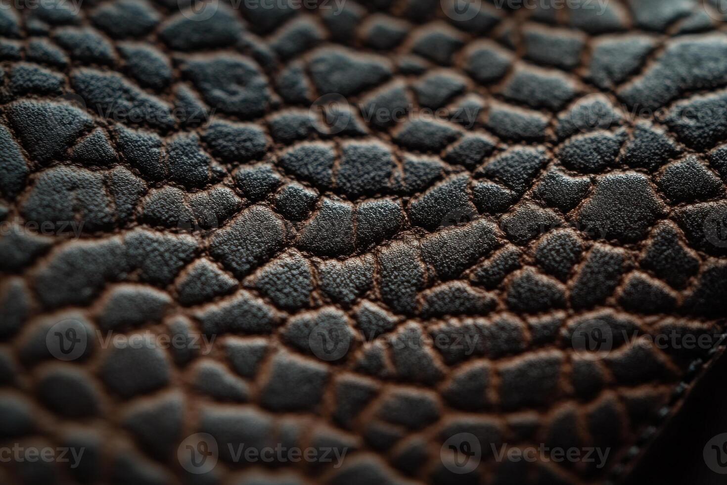 Close-up view of textured brown leather with a unique pattern and soft finish photo