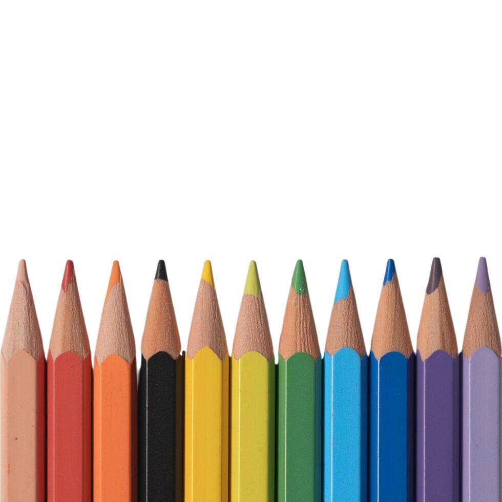 Vibrant pencils neatly aligned on a plain white backdrop photo