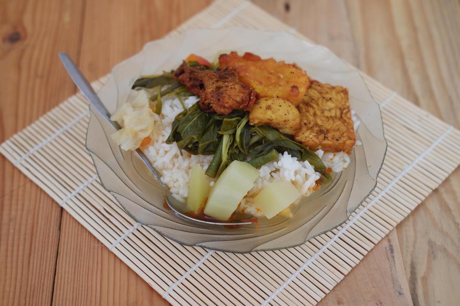 Nutritious plate of food featuring rice and assorted vegetables, a balanced and delicious dish photo