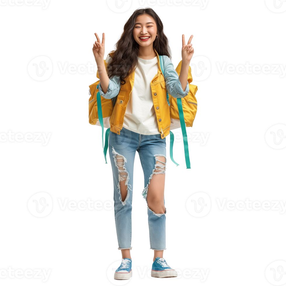 Full length portrait of a smiling young asian woman with backpack showing victory gesture isolated on transparent background png