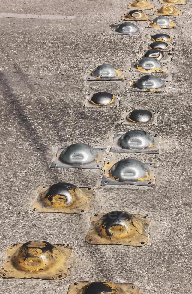 Speed limiters on the road in Mexico. photo
