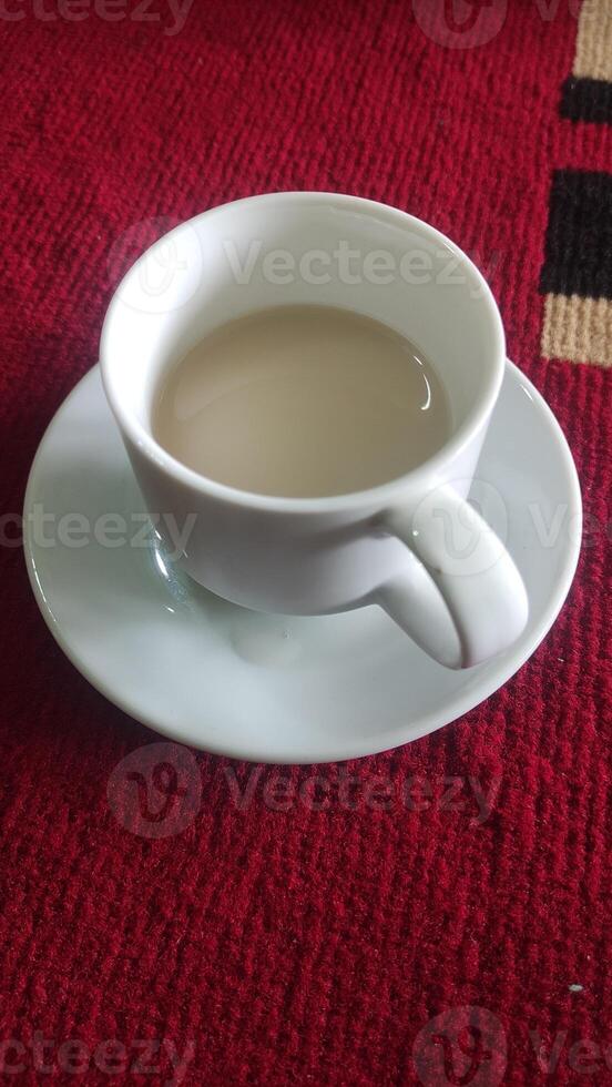 a glass of fresh cow's milk in the morning photo