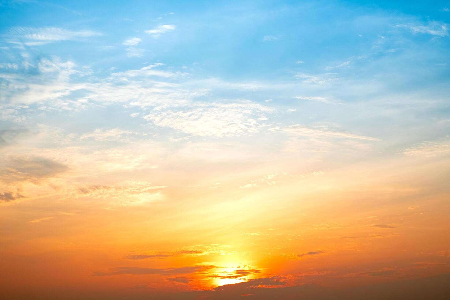 Beautiful , luxury soft gradient orange gold clouds and sunlight on the blue sky perfect for the background, take in everning,Twilight, Large size, high definition landscape photo