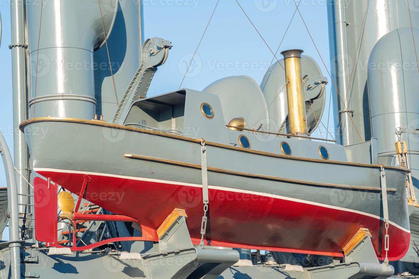 steam launch as a means of rescue on an old warship photo