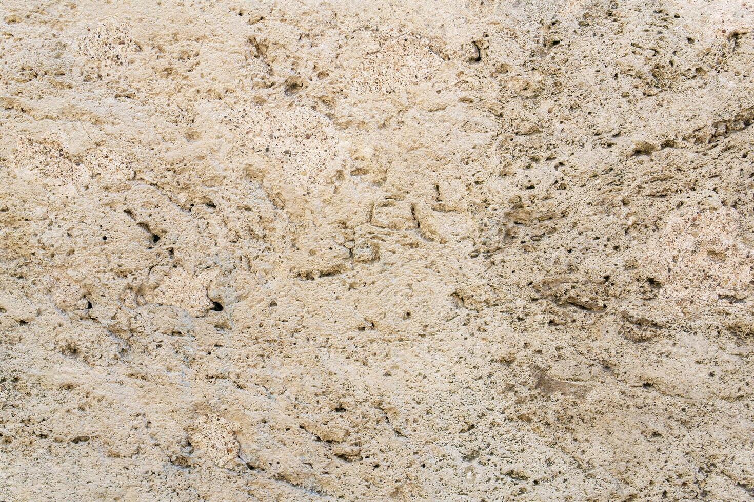 architectural background, texture, wall surface made of light stone photo