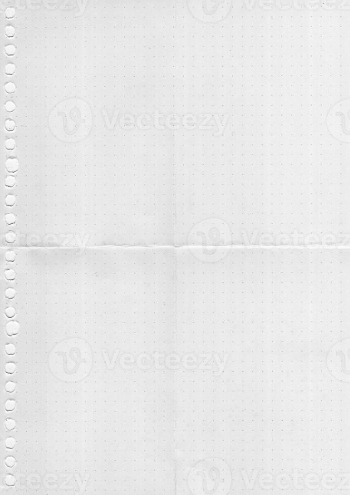 white Paper in Dots Pattern. Paper texture background, grid book , dot paper photo