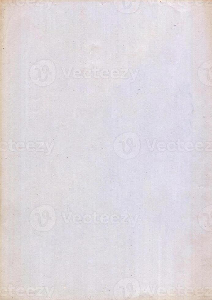 Interesting texture of old paper, soiled and damaged, as well as darkened by time and use, on a white background. Unique vintage texture of old paper which is approximately 60-70 years old. photo