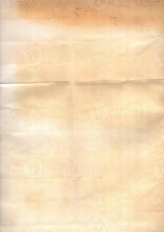 Interesting texture of old paper, soiled and damaged, as well as darkened by time and use, on a white background. Unique vintage texture of old paper which is approximately 60-70 years old. photo