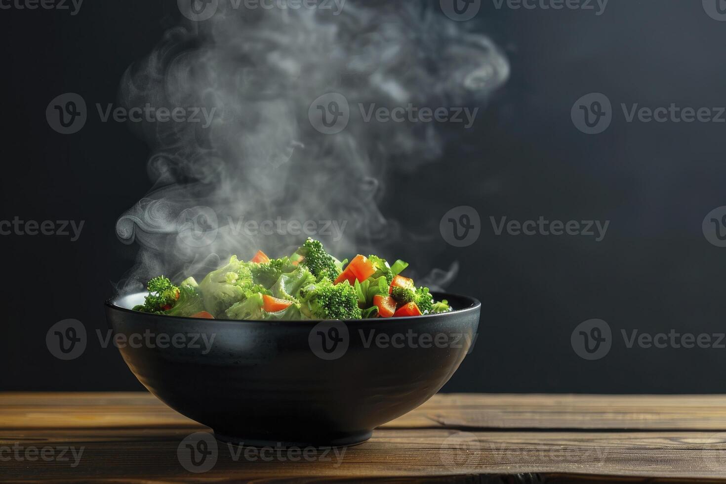 A bowl of vegetables with steam rising from it photo