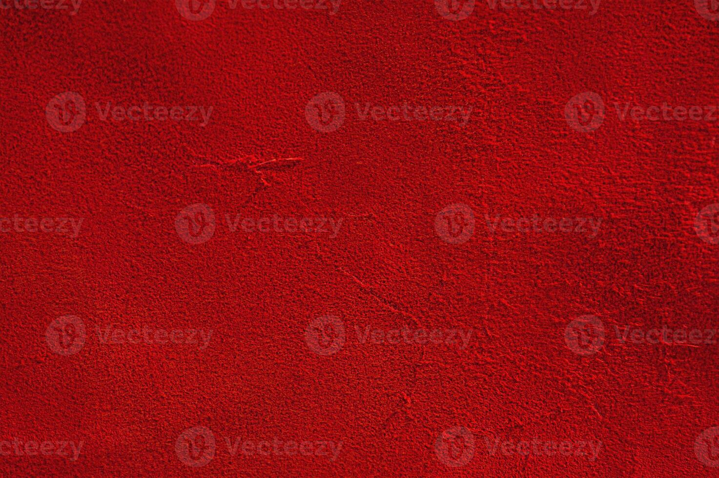 Red suede macro texture light and shadow. photo