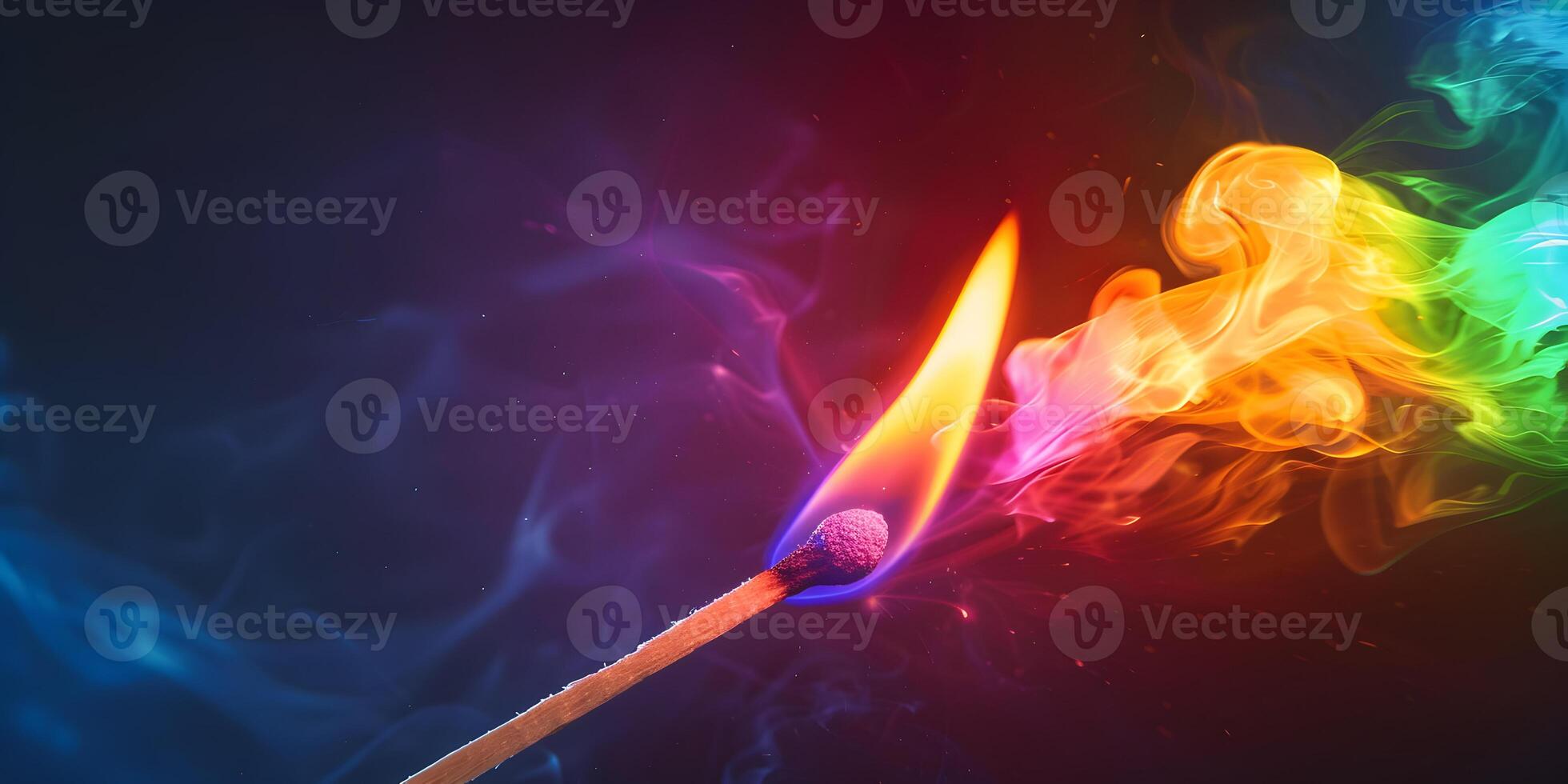 A burning match in different colors photo