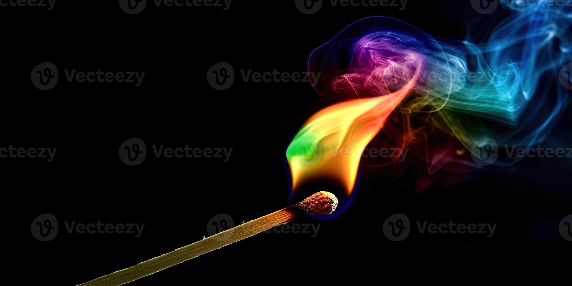 Matchstick with rainbow colored smoke on it photo