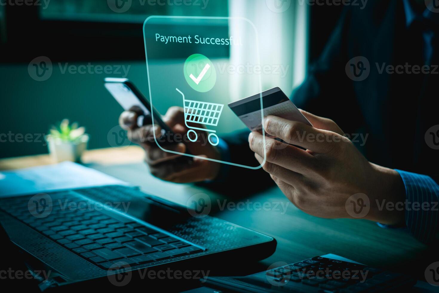 Person Making Online Payment with Credit Card on Laptop, Holographic Interface Showing Payment Successful and Shopping Icons, Representing E-commerce and Digital Transactions photo