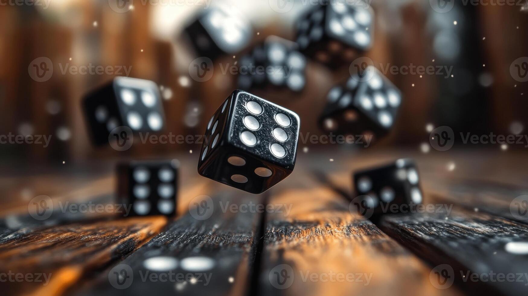 Black dice falling on a wooden table, Concept of chance, gambling, and risk photo