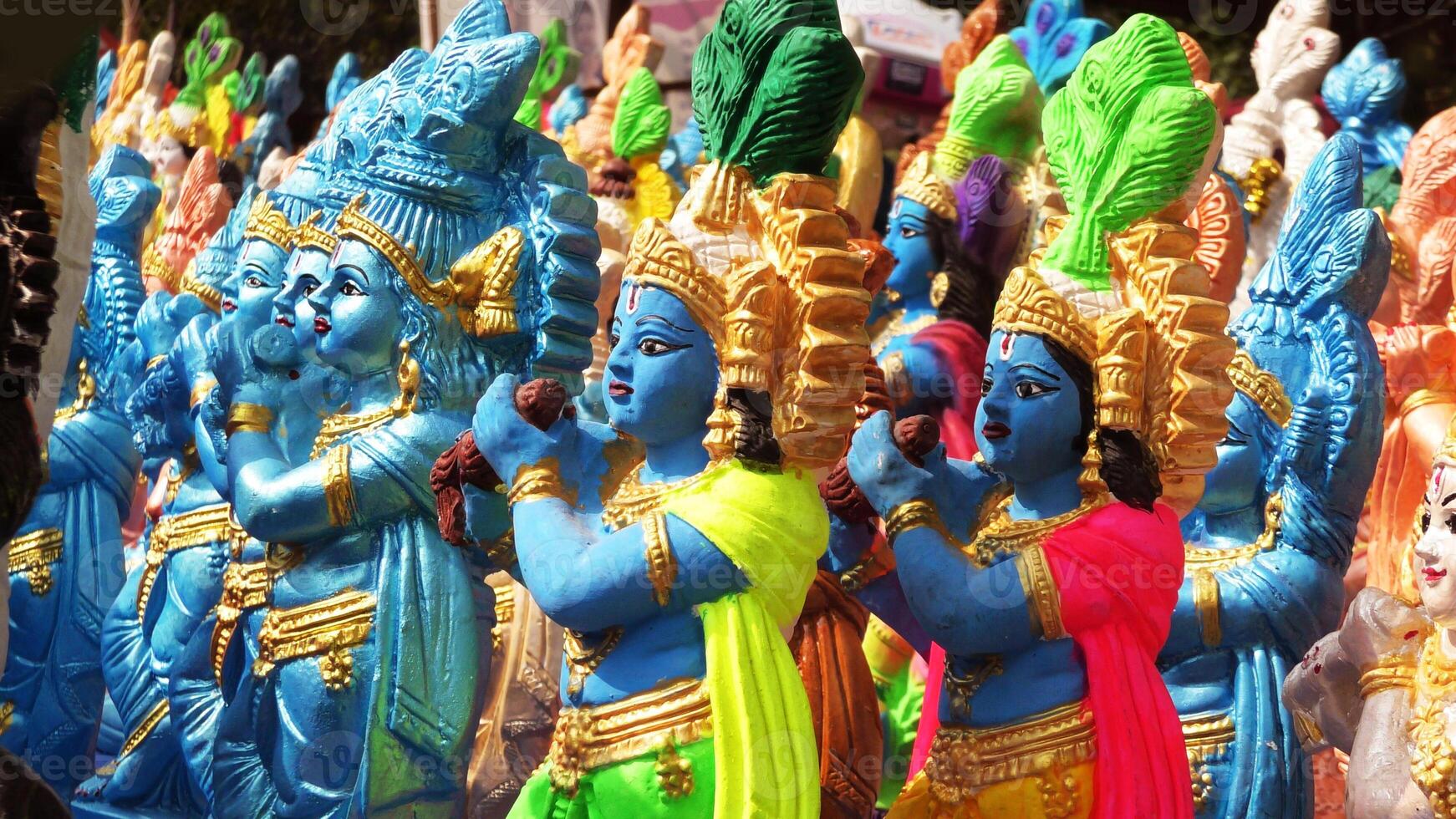 Colorful mythological sculptures displayed in a handicraft shop photo