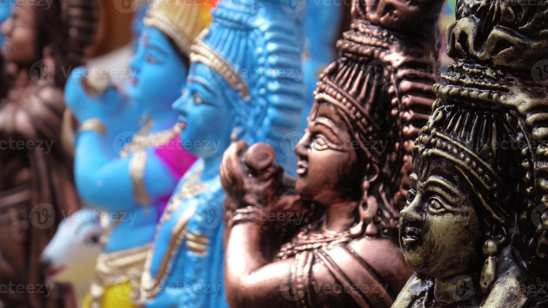Colorful mythological sculptures displayed in a handicraft shop photo
