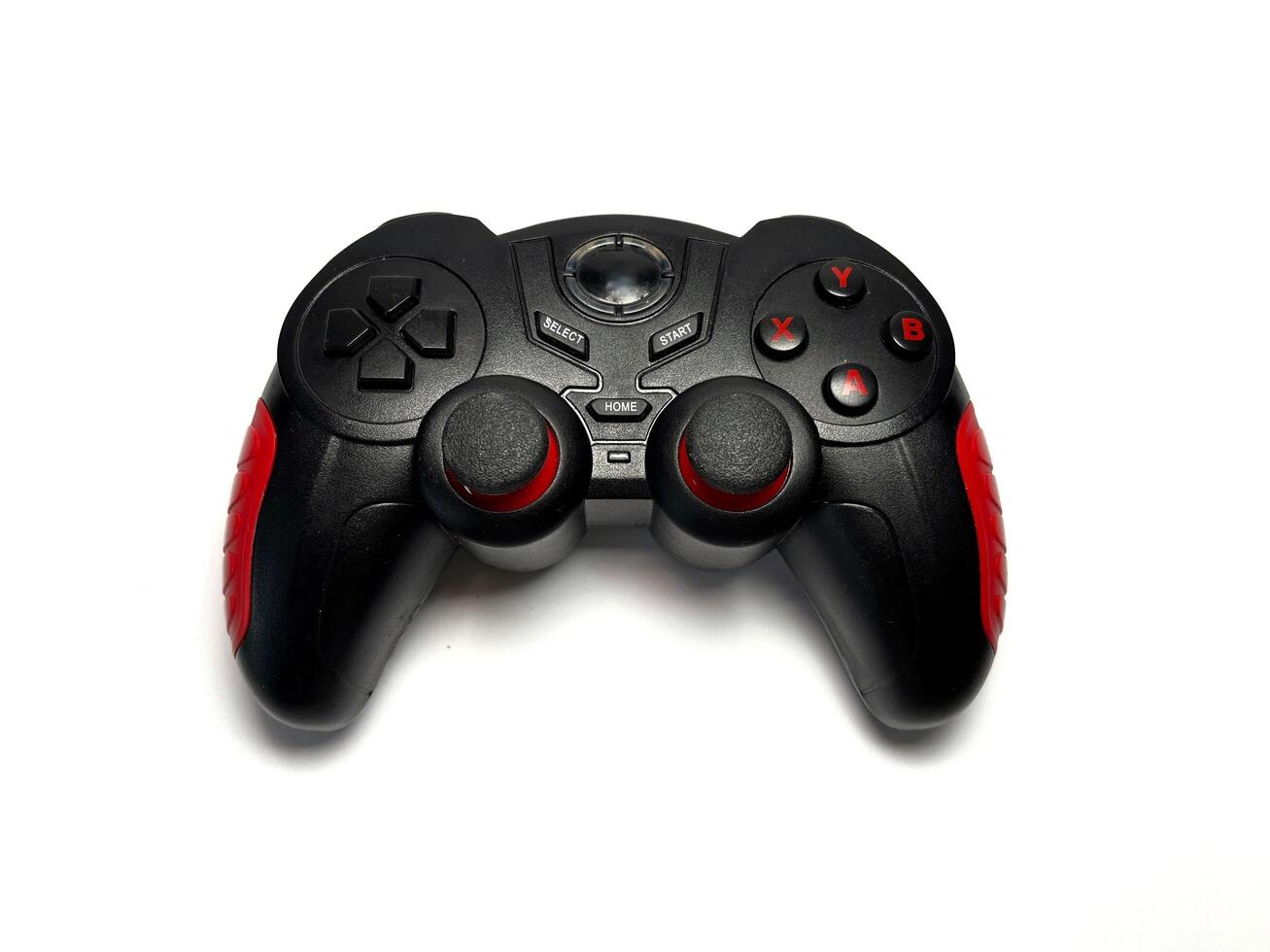 Black joystick isolated on white background. Gamepad for games. photo