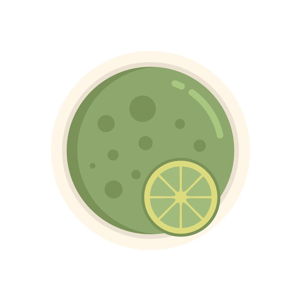 Green pea cream soup with a slice of lime in a bowl vector
