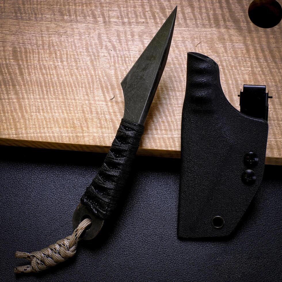 Handmade kiridashi knife Japanese style on a black background photo