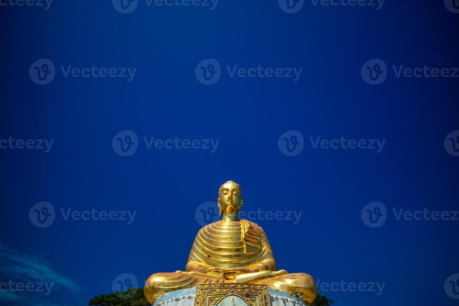 The Buddha statue in Prachuap Khiri Khan, Thailand is located on an island next to the sea. photo