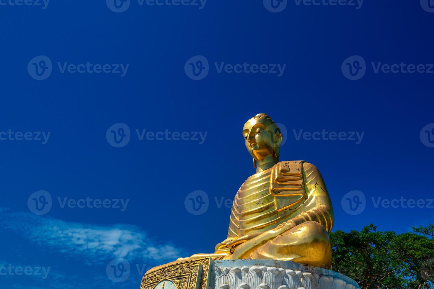 The Buddha statue in Prachuap Khiri Khan, Thailand is located on an island next to the sea. photo