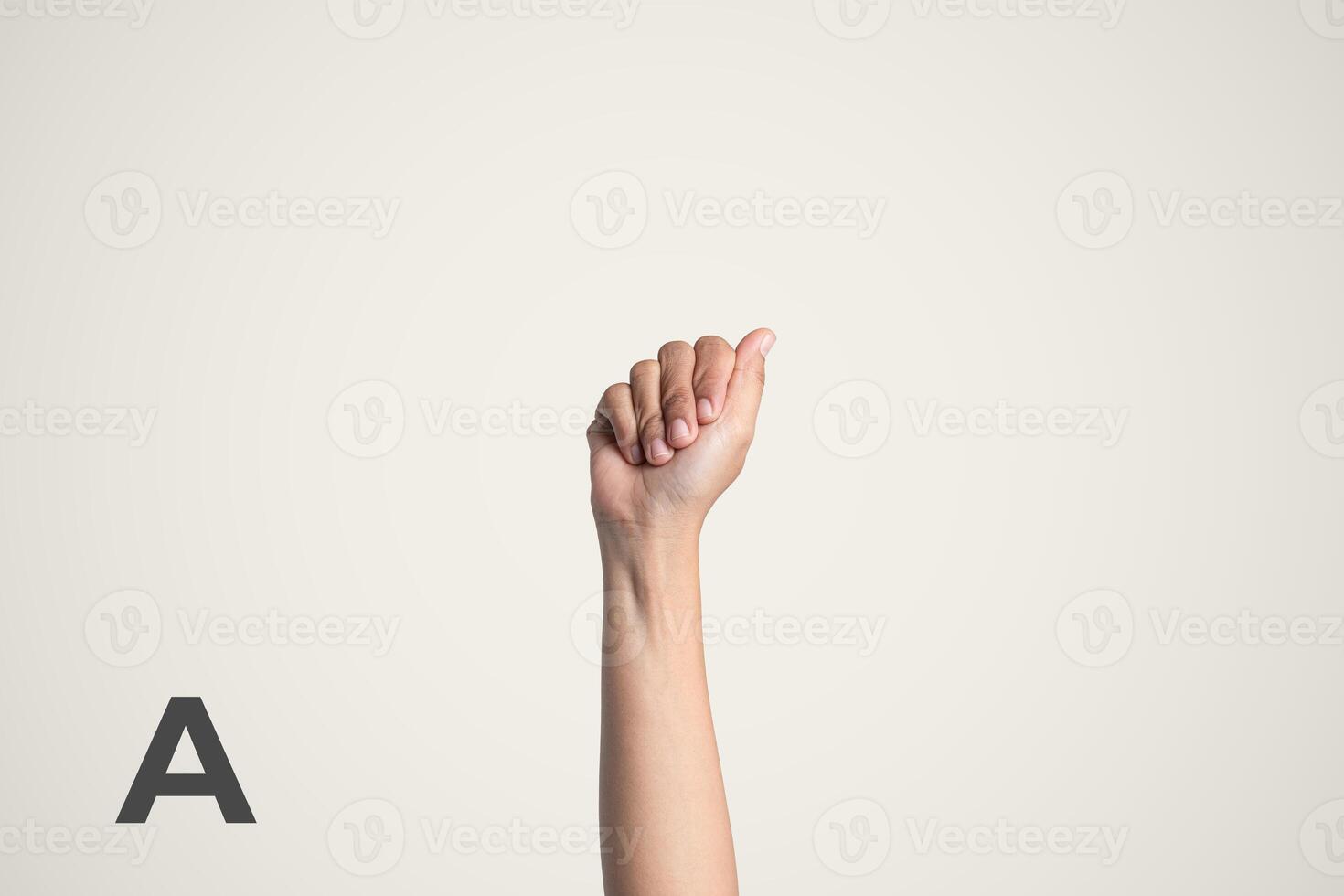 Deaf Sign alphabet of A, American Sign Language ASL. Isolated object Finger spelling the alphabet photo