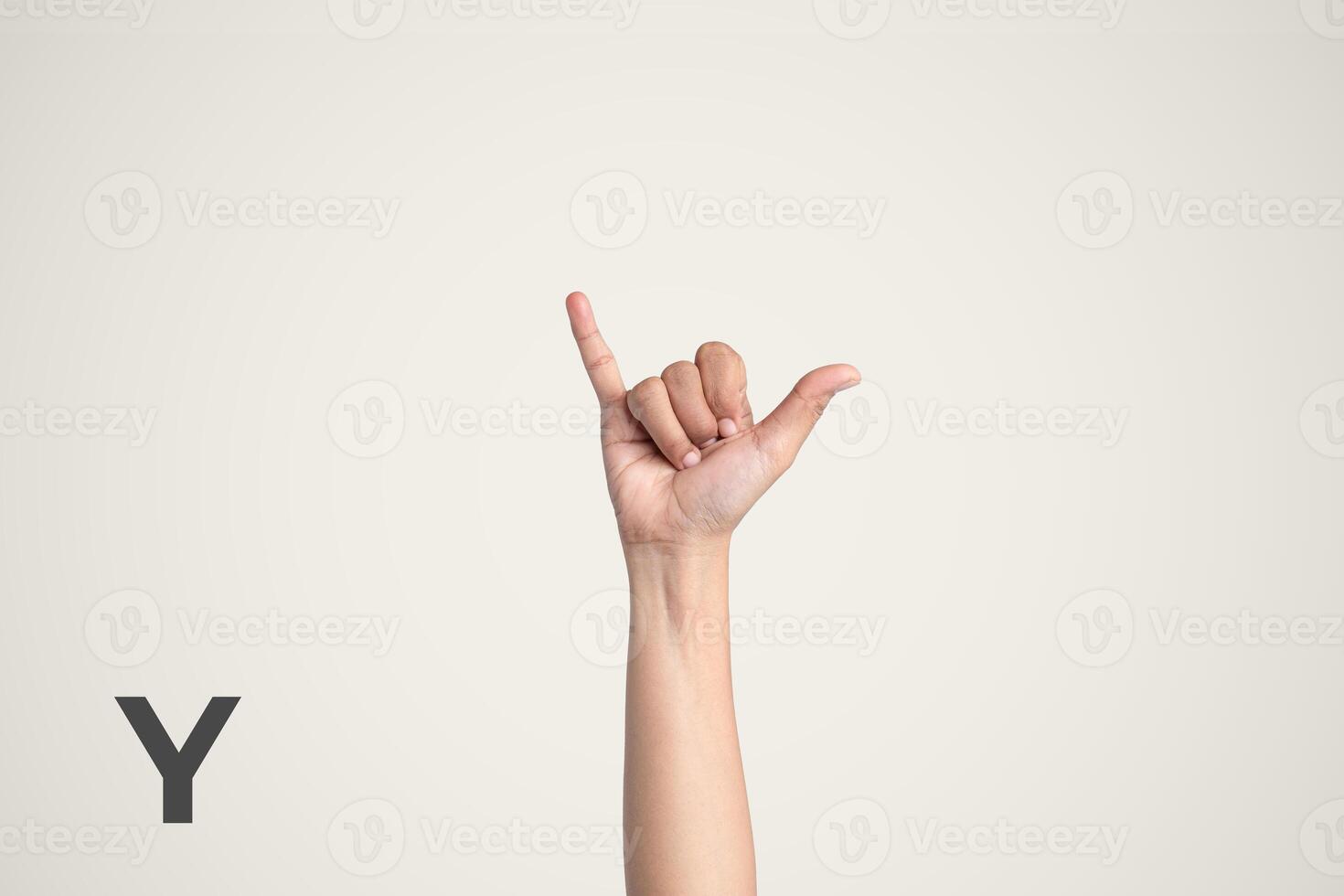 Deaf Sign alphabet of Y, American Sign Language ASL. Isolated object Finger spelling the alphabet photo