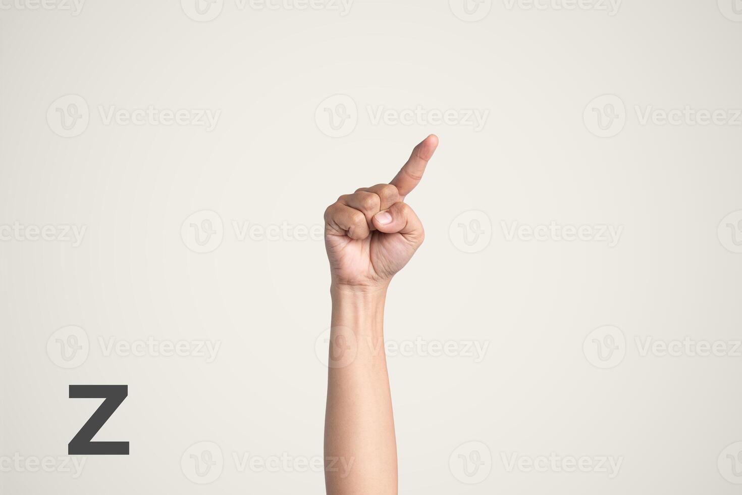 Deaf Sign alphabet of Z, American Sign Language ASL. Isolated object Finger spelling the alphabet photo