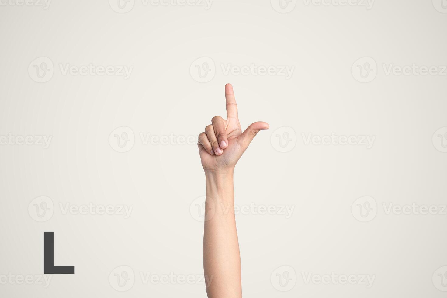 Deaf Sign alphabet of L, American Sign Language ASL. Isolated object Finger spelling the alphabet photo