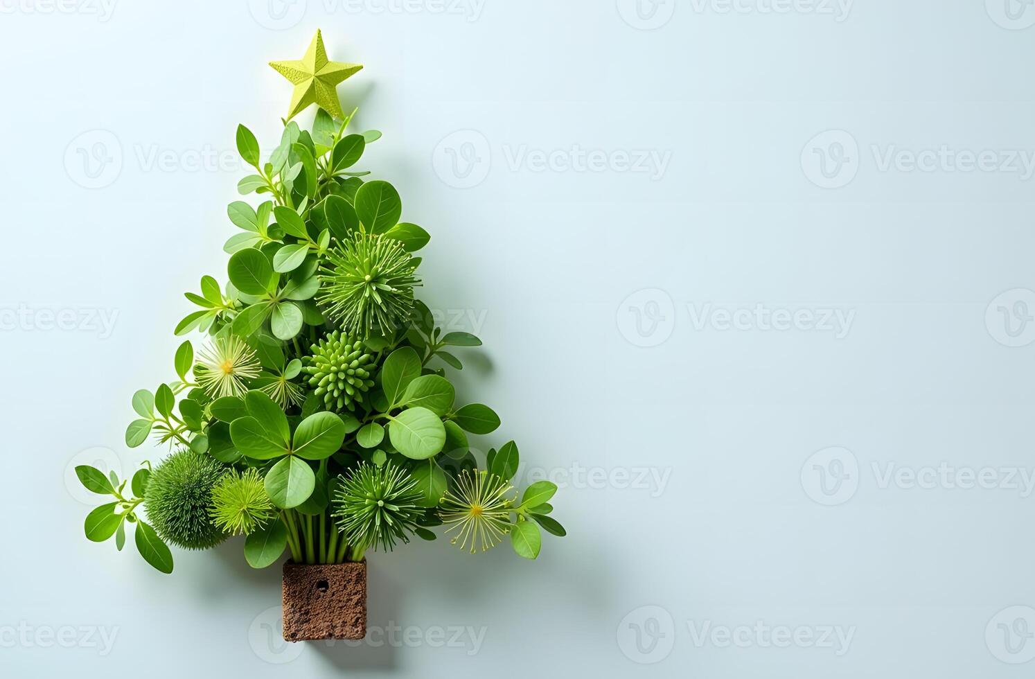 Christmas tree made of fresh green herbs and vegetables with a star topper photo
