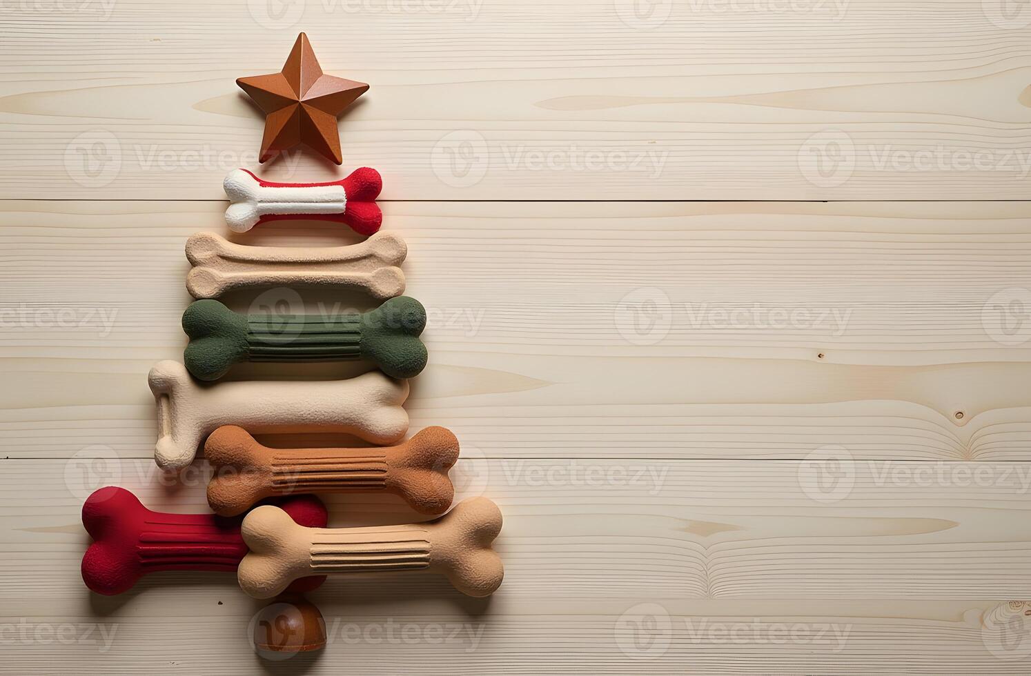 Christmas tree made of dog bones with festive ornaments and a star topper photo