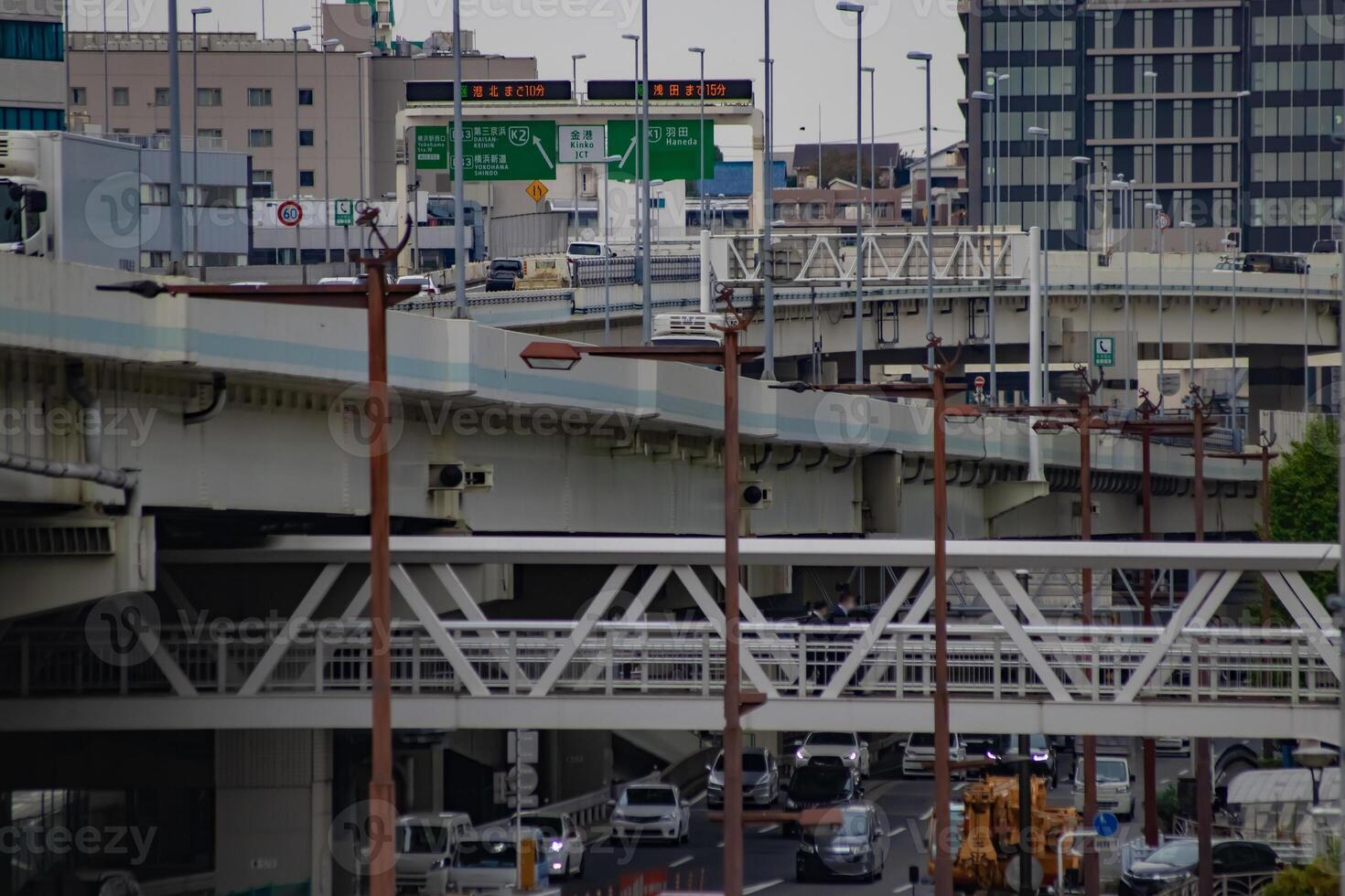 A cityscape of traffic jam at the city street in Yokohama in autumn telephoto shot photo