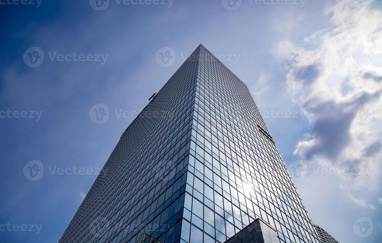 A cityscape of cloud reflecting on the building in Shinjuku Tokyo wide shot photo